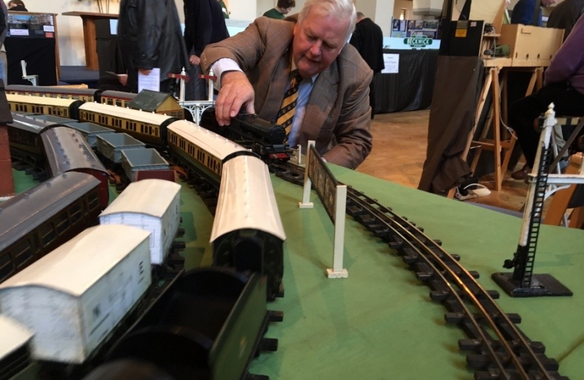 BobStewart is an Honorary Member of the Beckenham and West Wickham Model Railway Club.  On Saturday 22nd October he joined with other members at St John’s Church in Eden Park Avenue for the half- yearly model train show.  The photograph shows him putting the ‘Royal Scot’ back on its rails.